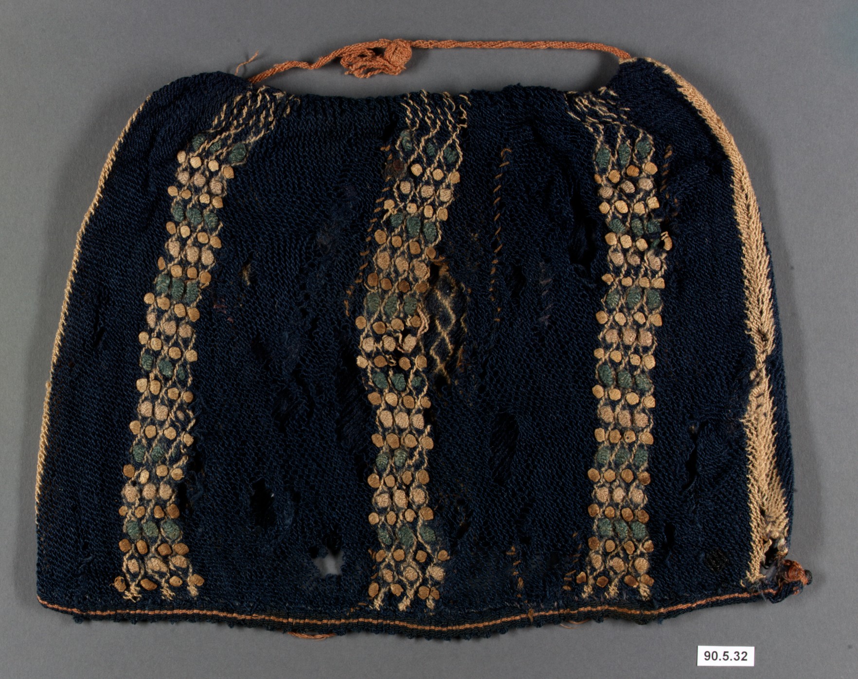 A knitted hat fragment, the collection object